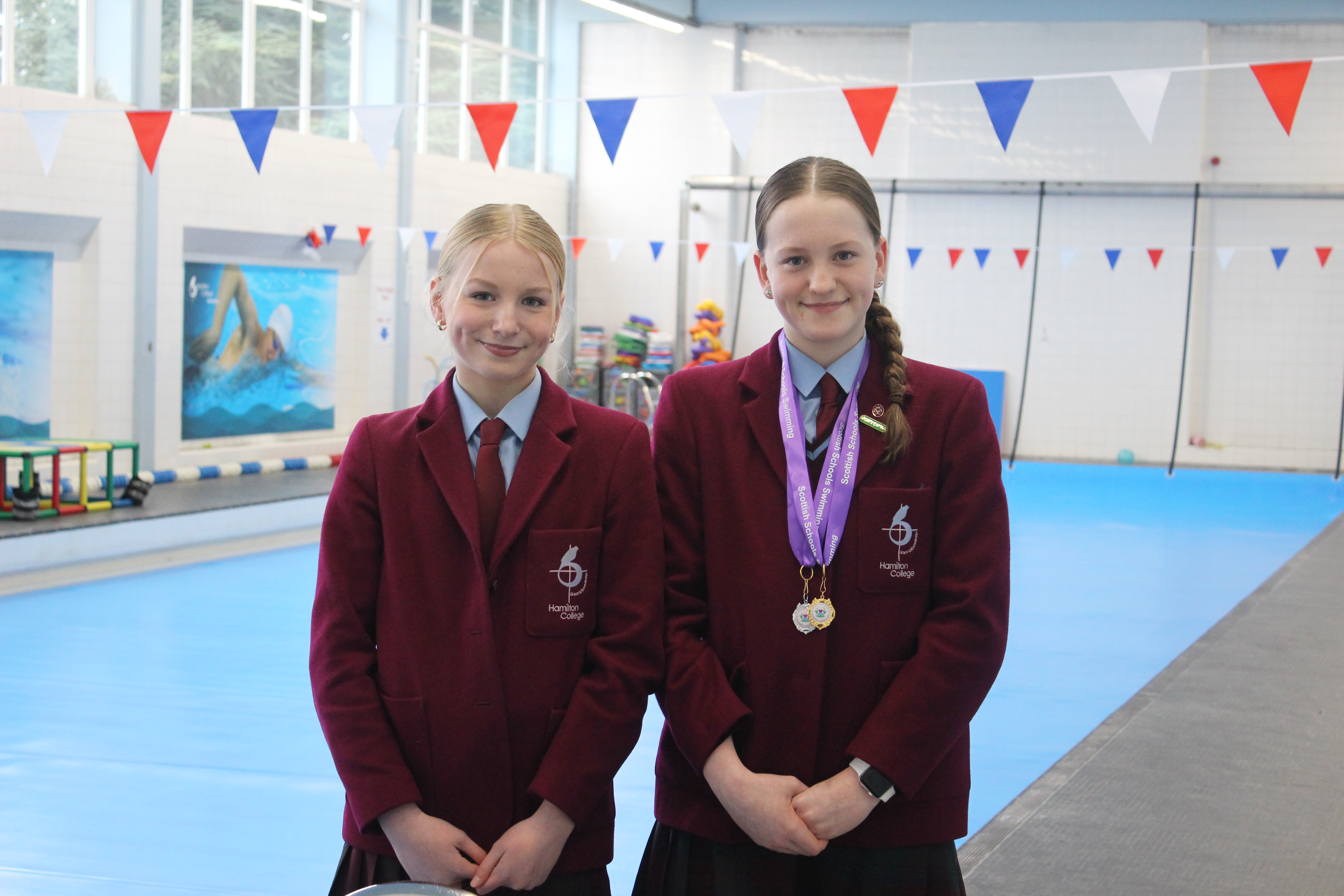 Lucy strikes gold at swimming finals